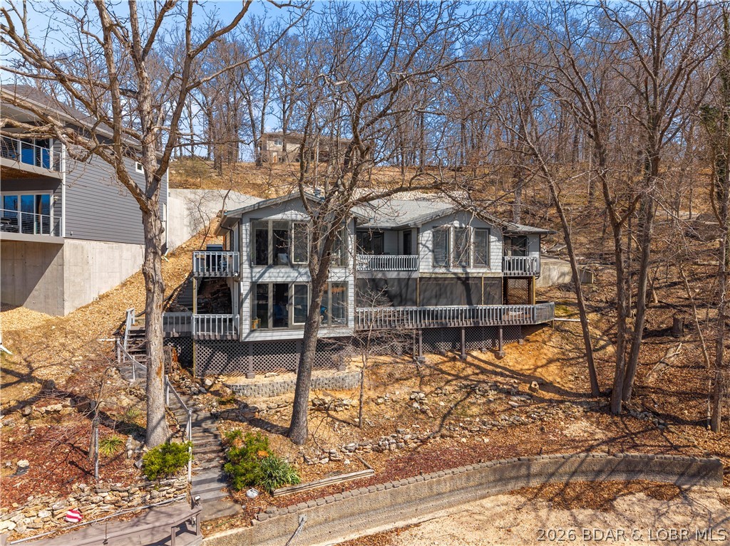 498 Wilmore Road Lake Ozark, MO 65049 - Photo 29 of 57 Low maintenance backyard with plenty of room to ad