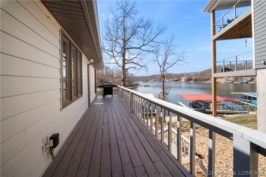 498 Wilmore Road Lake Ozark, MO 65049 - Photo 47 of 57 Wrap around deck leads to front of home or to lake