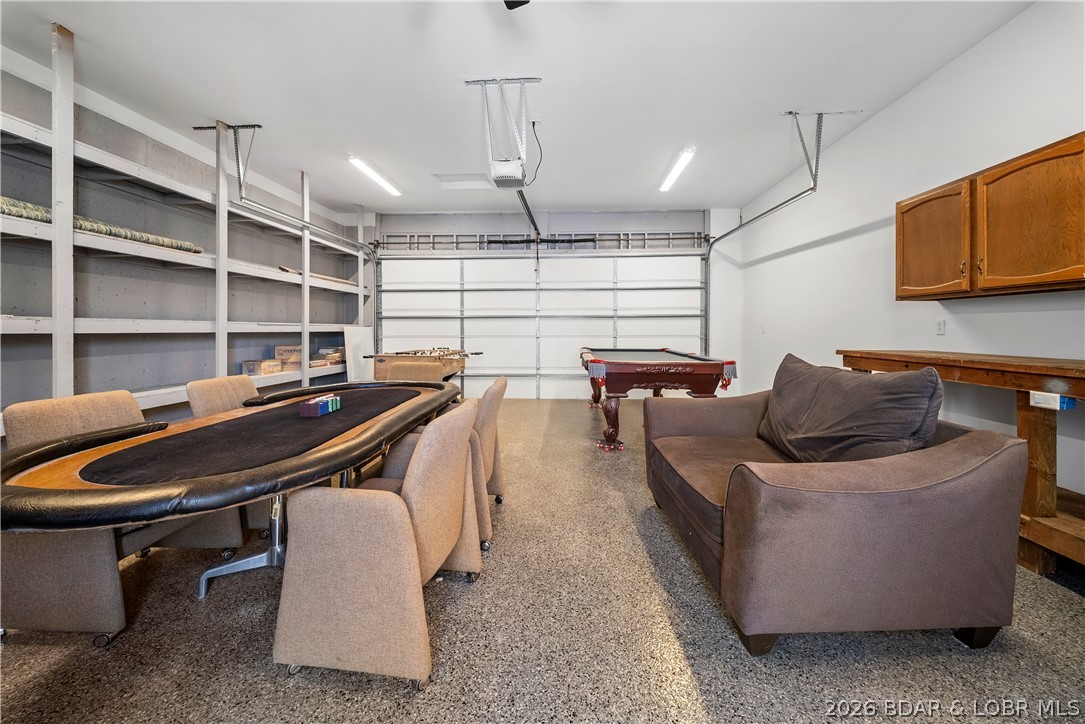 498 Wilmore Road Lake Ozark, MO 65049 - Photo 50 of 57 Game Room has seating & poker table