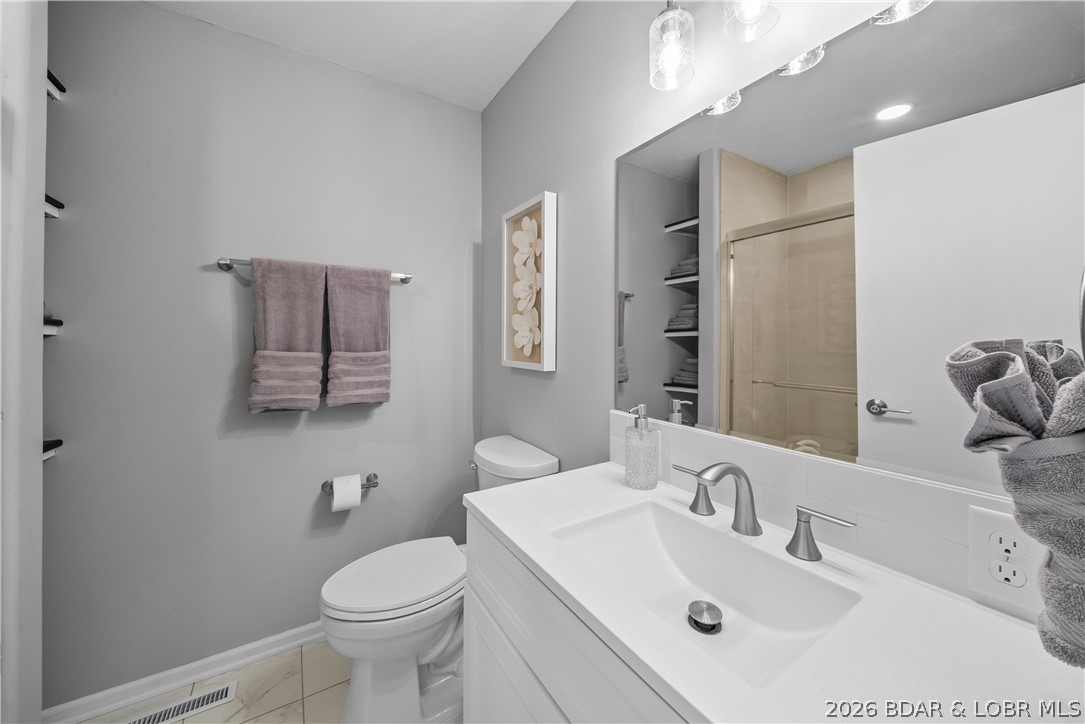 498 Wilmore Road Lake Ozark, MO 65049 - Photo 8 of 57 Primary Bath been beautifully updated