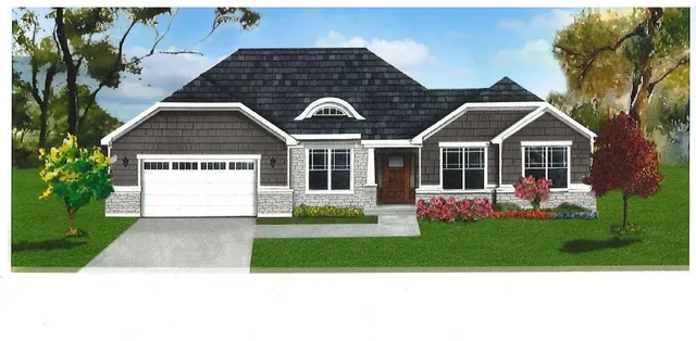 a front view of a house with a garden