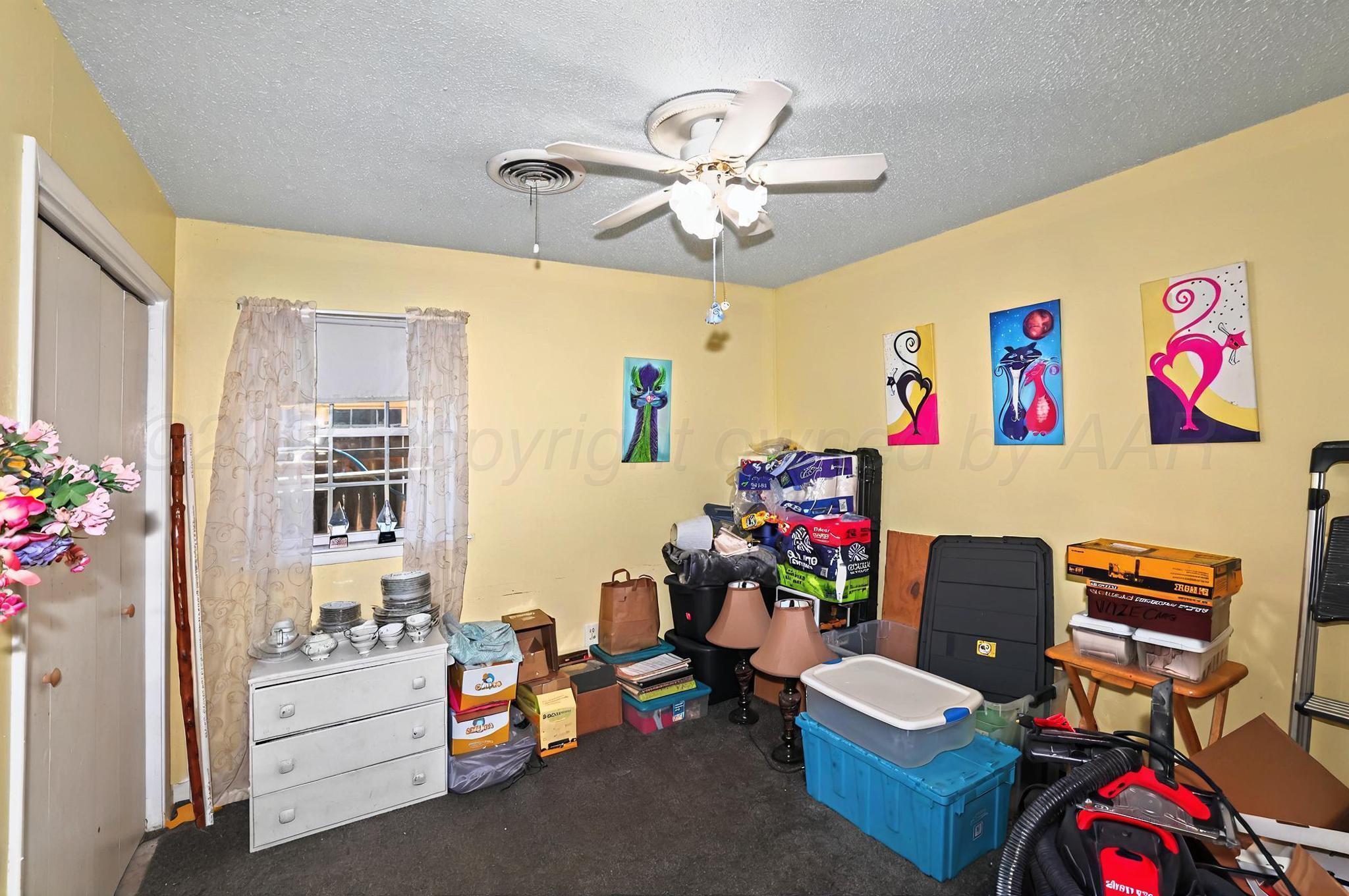 6005 Gainsborough Road Amarillo, TX 79106 - Photo 11 of 19 a children room with toys
