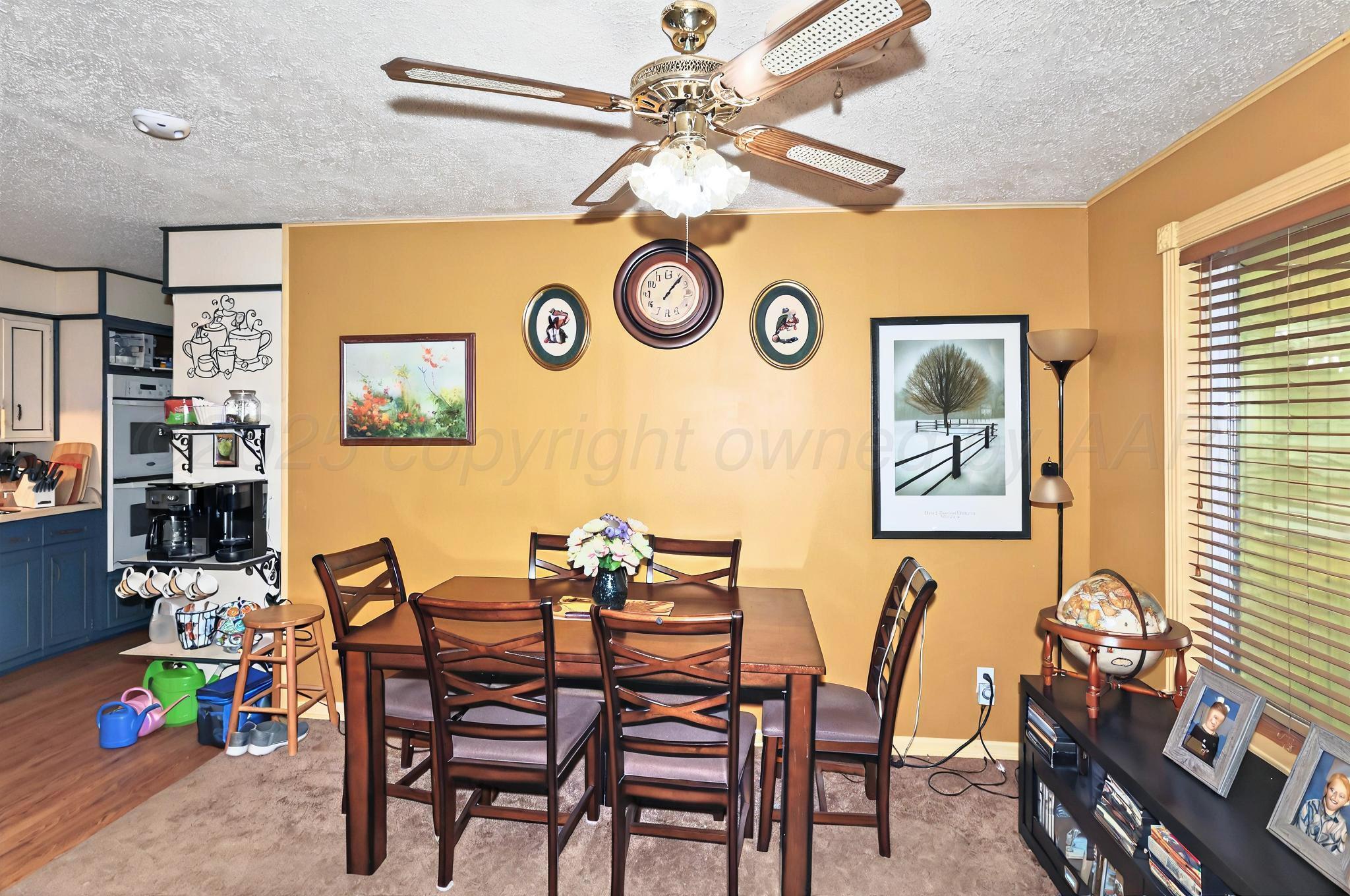 6005 Gainsborough Road Amarillo, TX 79106 - Photo 4 of 19 a dining room with furniture and window