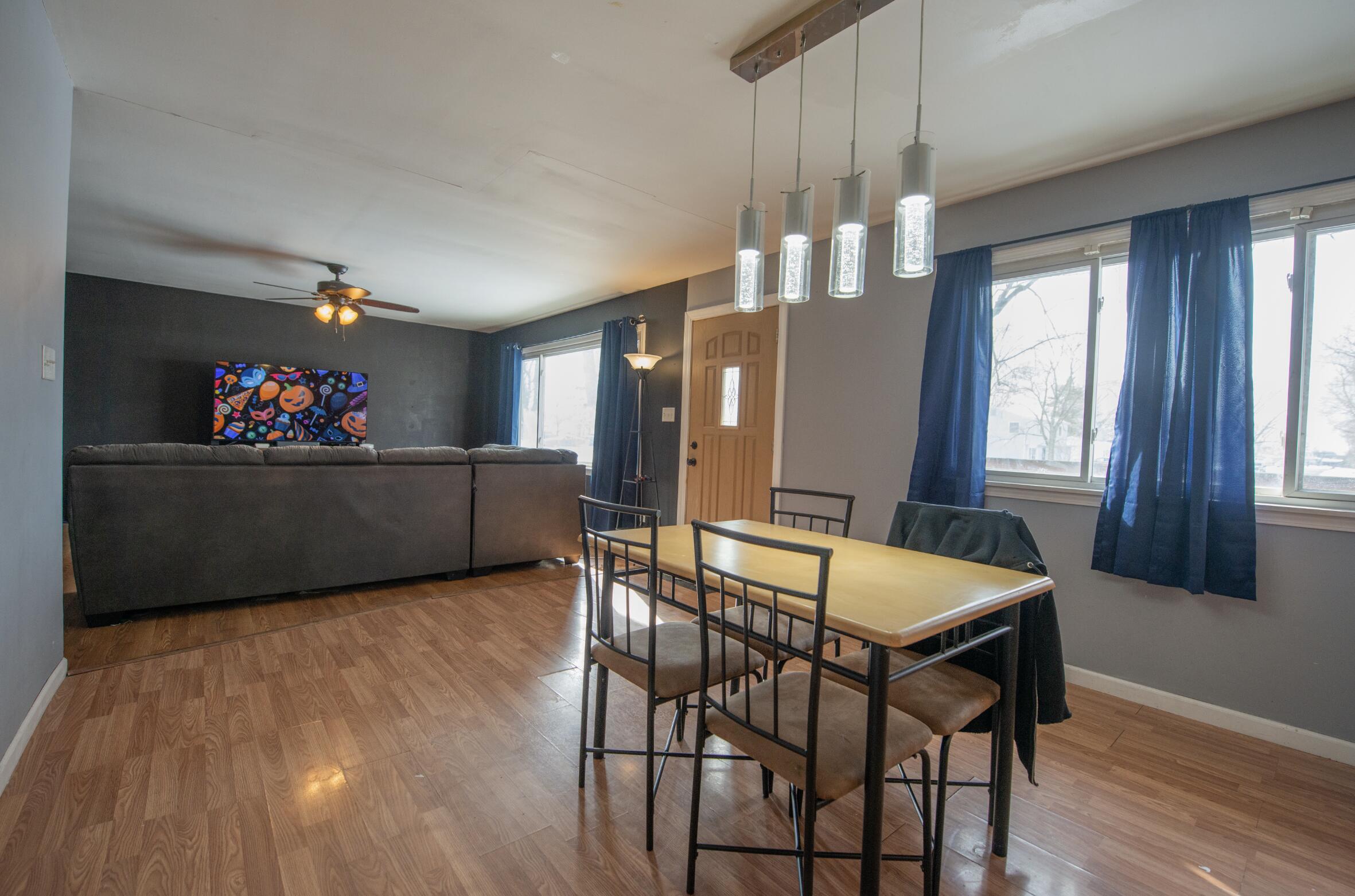 763 Timberline Parkway Valparaiso, IN 46385 - Photo 3 of 16 a living room with furniture and a wooden floor