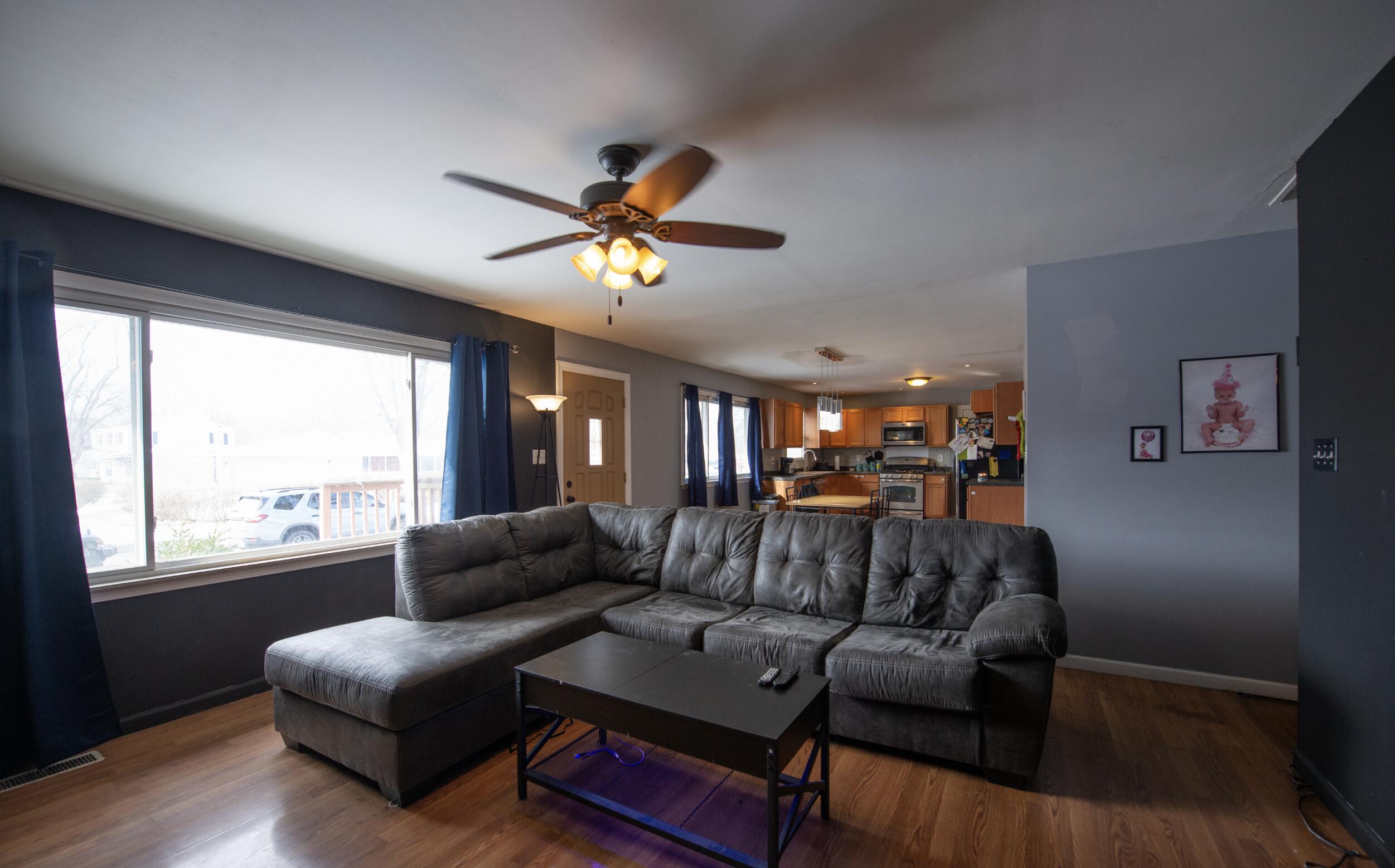 763 Timberline Parkway Valparaiso, IN 46385 - Photo 4 of 16 a living room with furniture and a large window