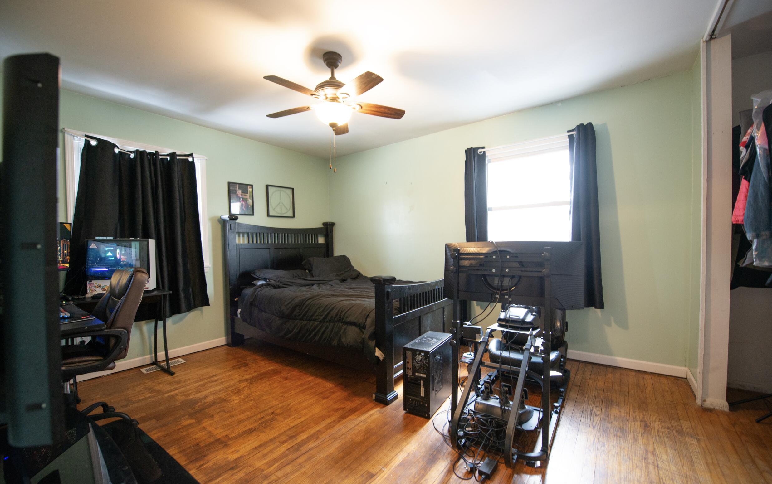 763 Timberline Parkway Valparaiso, IN 46385 - Photo 6 of 16 a living room with furniture and a flat screen tv