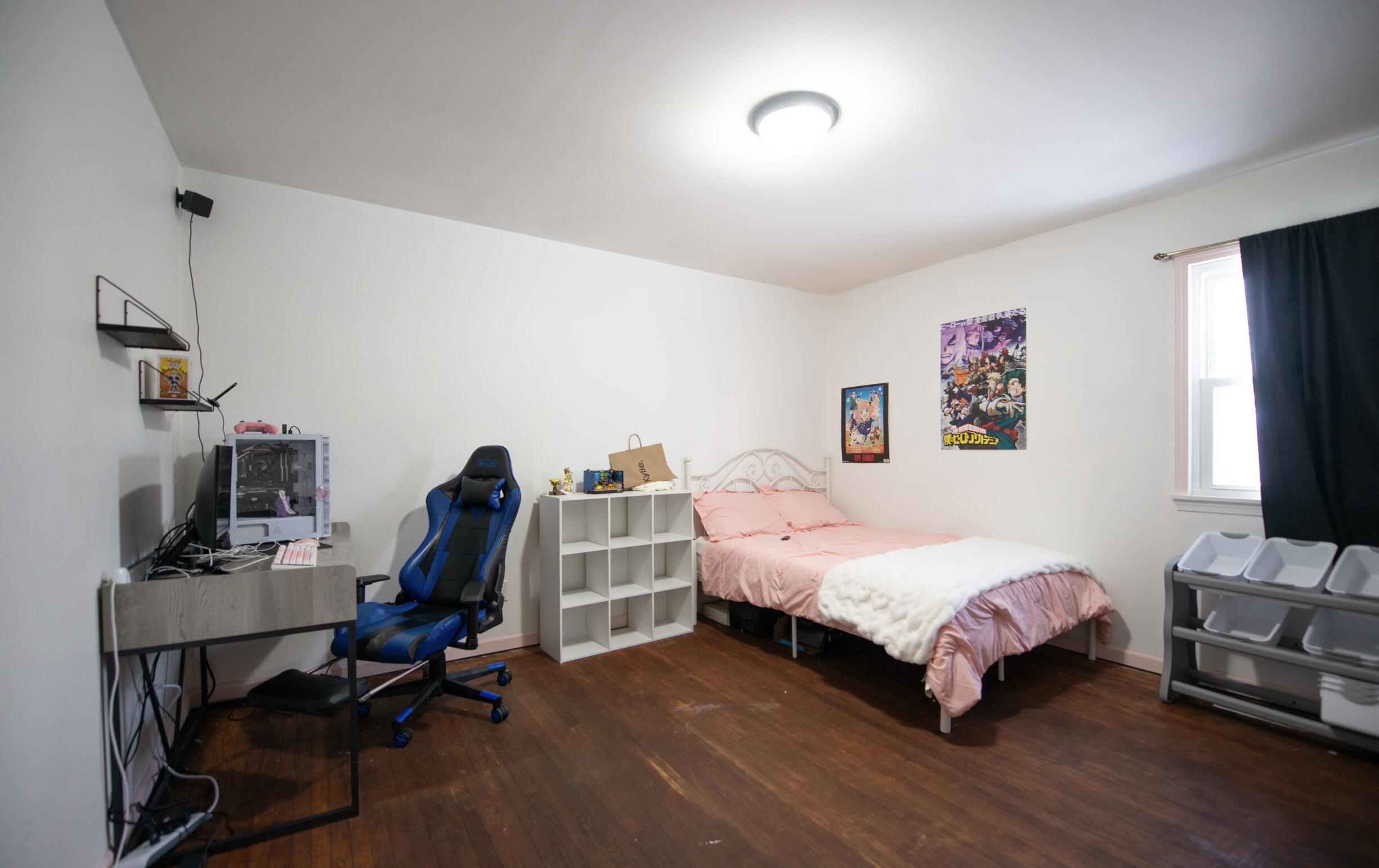 763 Timberline Parkway Valparaiso, IN 46385 - Photo 10 of 16 a bedroom with a bed a desk and chair