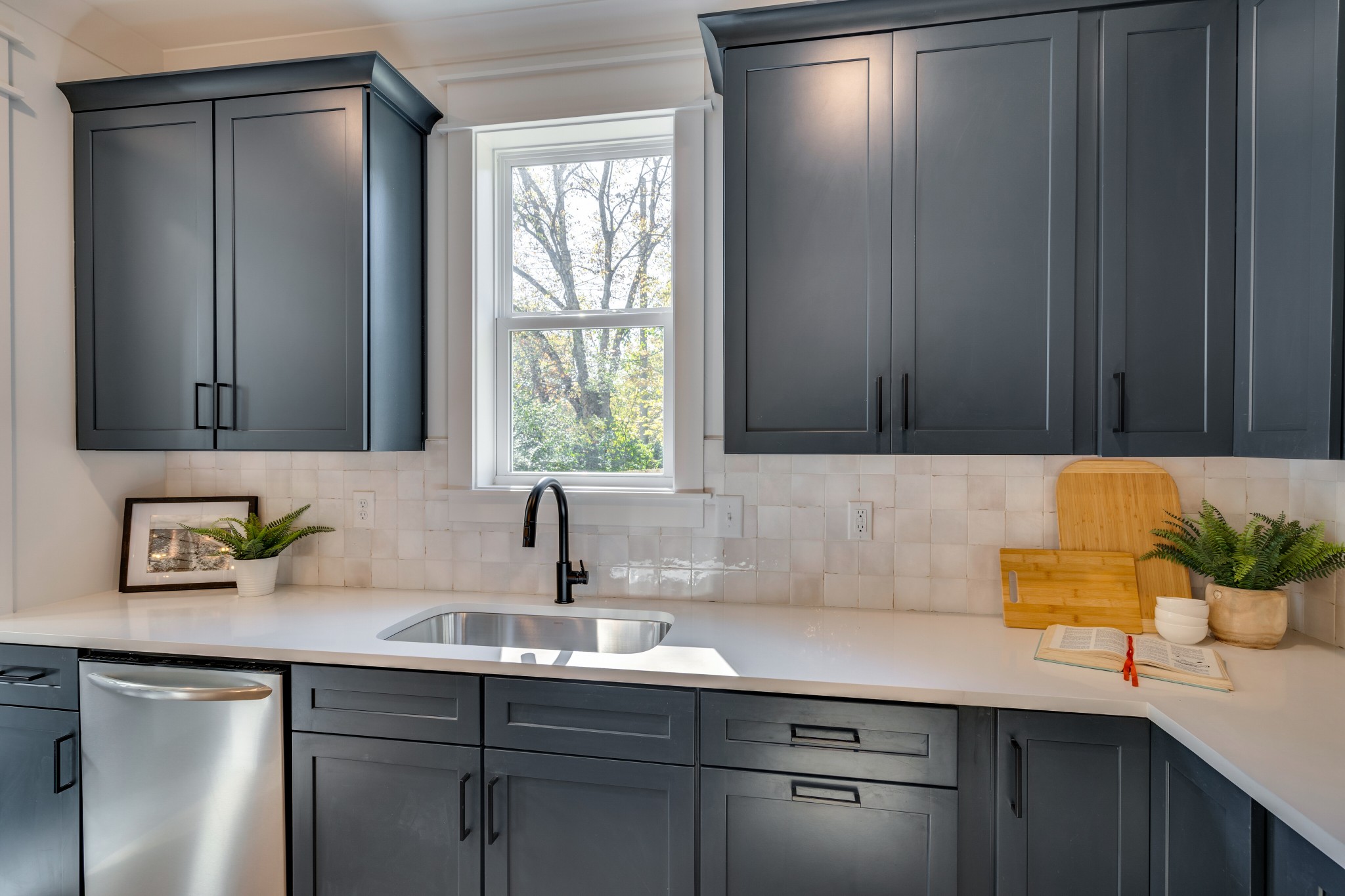 411 High Street Nashville, TN 37211 - Photo 15 of 32 a kitchen with a sink cabinets and window