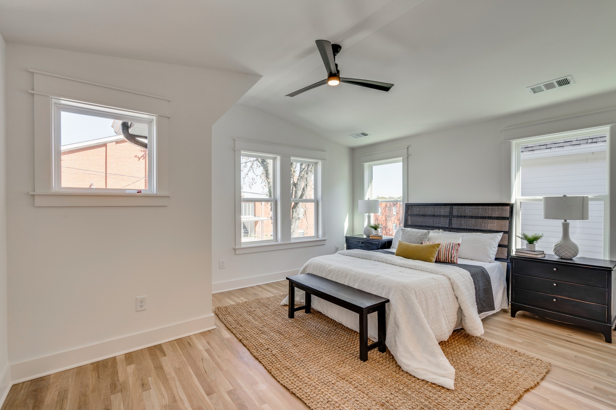 411 High Street Nashville, TN 37211 - Photo 20 of 32 a bedroom with a bed and wooden floor