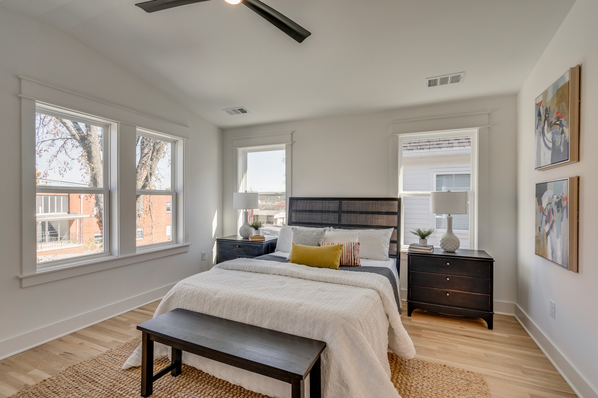 411 High Street Nashville, TN 37211 - Photo 21 of 32 a bedroom with a bed and wooden floor