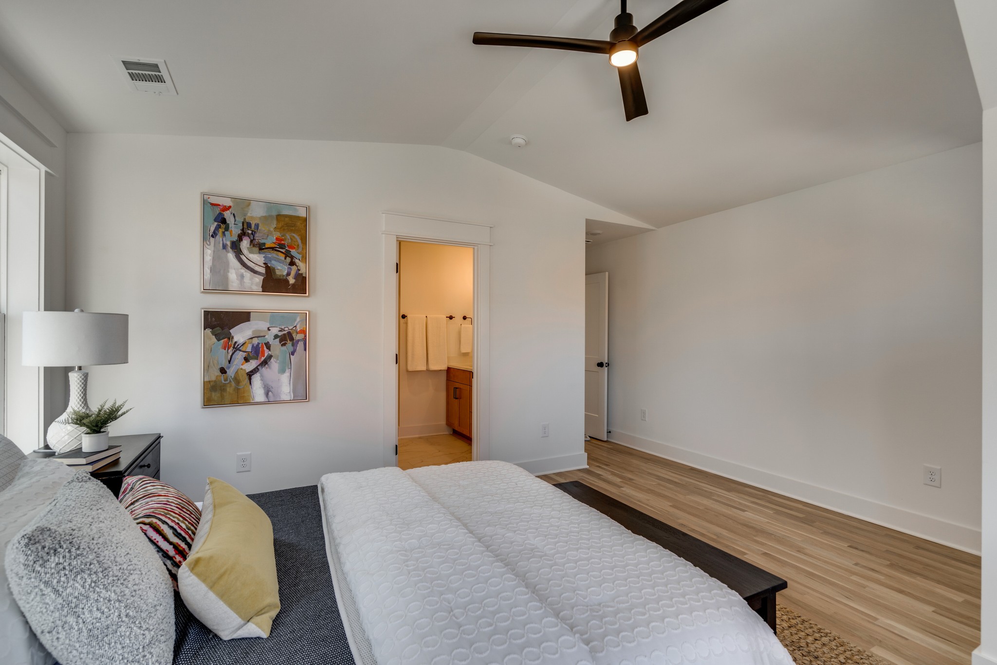 411 High Street Nashville, TN 37211 - Photo 22 of 32 a bedroom with a bed and wooden floor