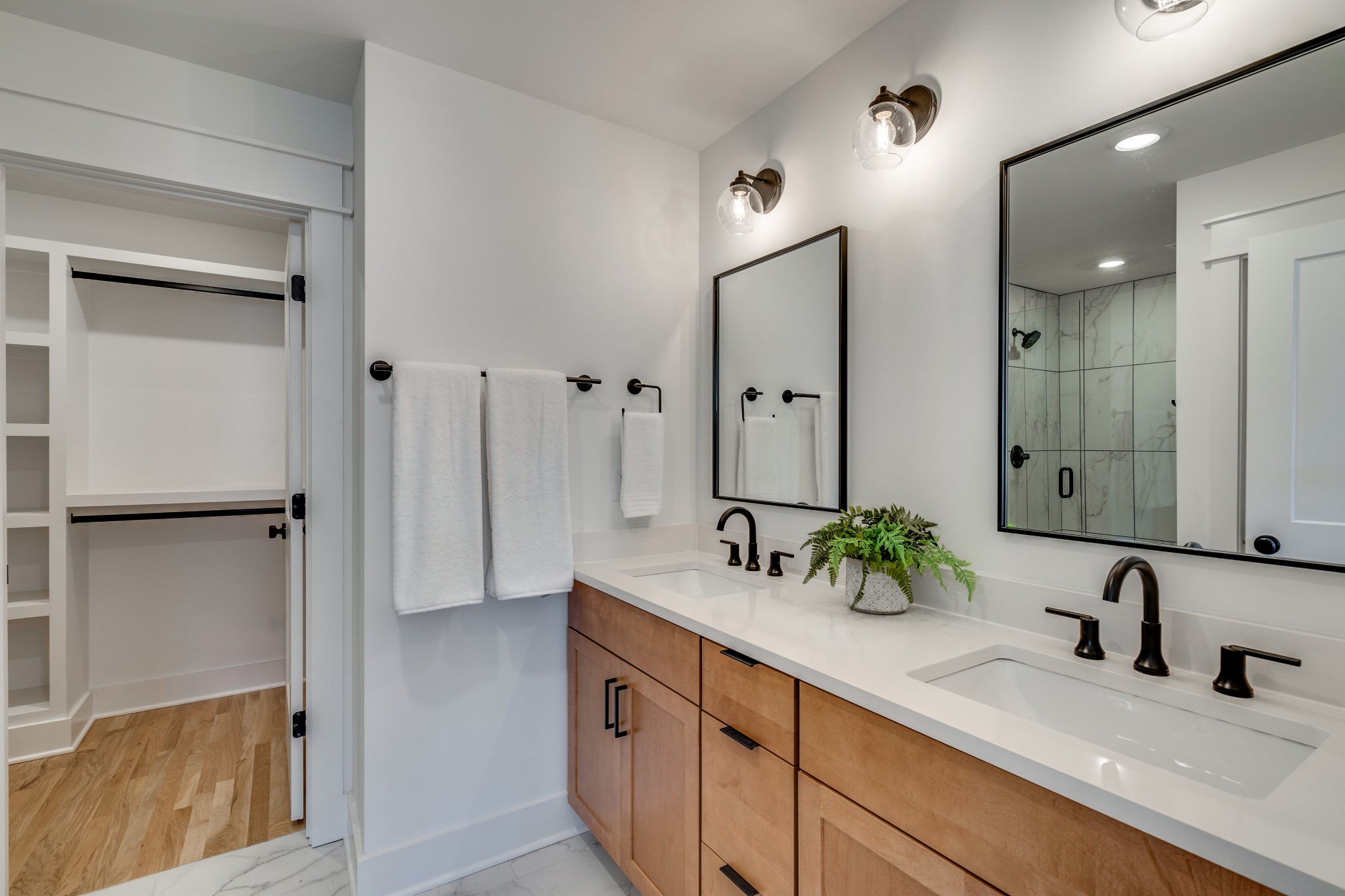 411 High Street Nashville, TN 37211 - Photo 23 of 32 a bathroom with a double vanity sink and mirror