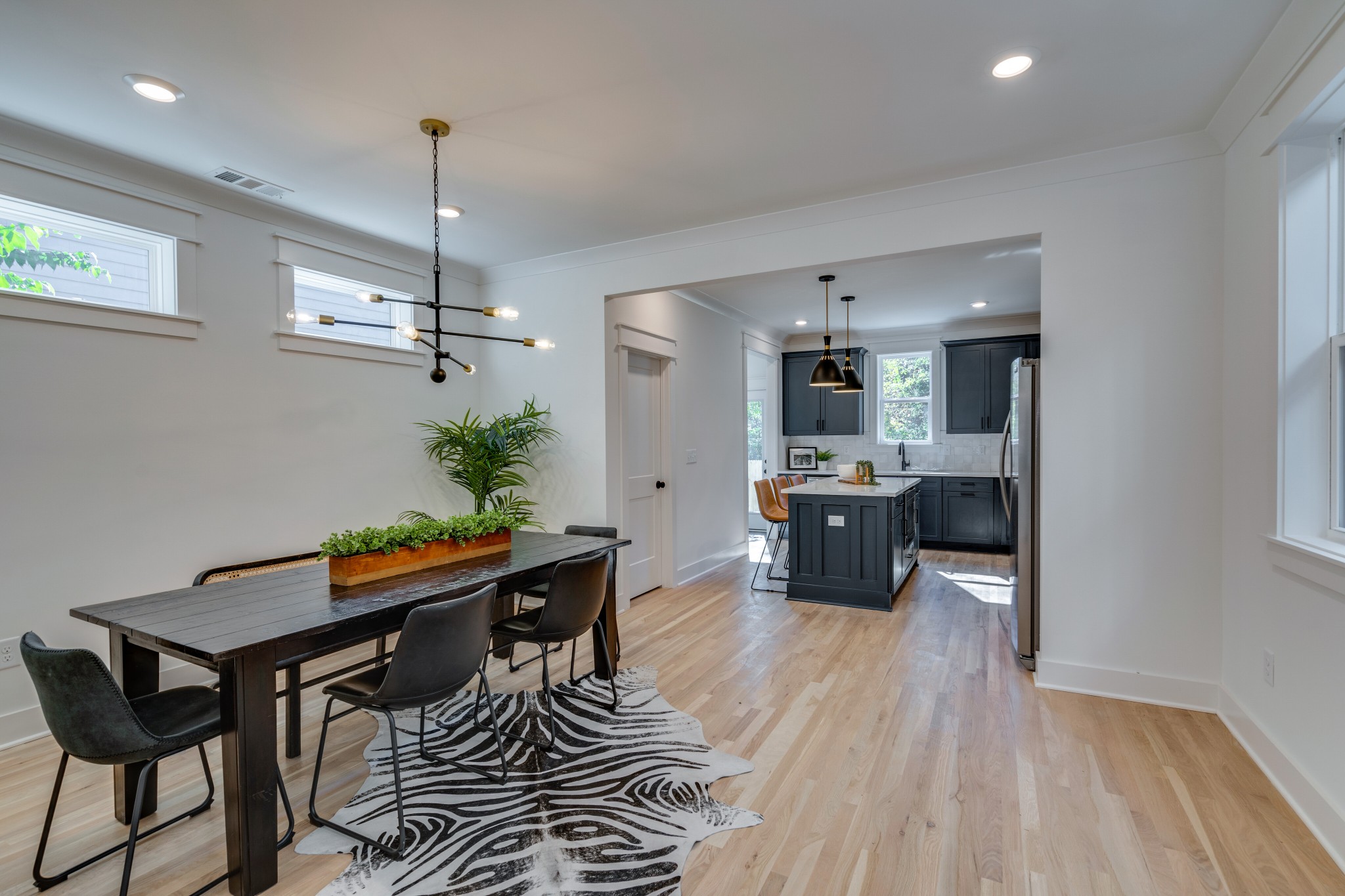 411 High Street Nashville, TN 37211 - Photo 10 of 32 a kitchen with a table and chairs in it