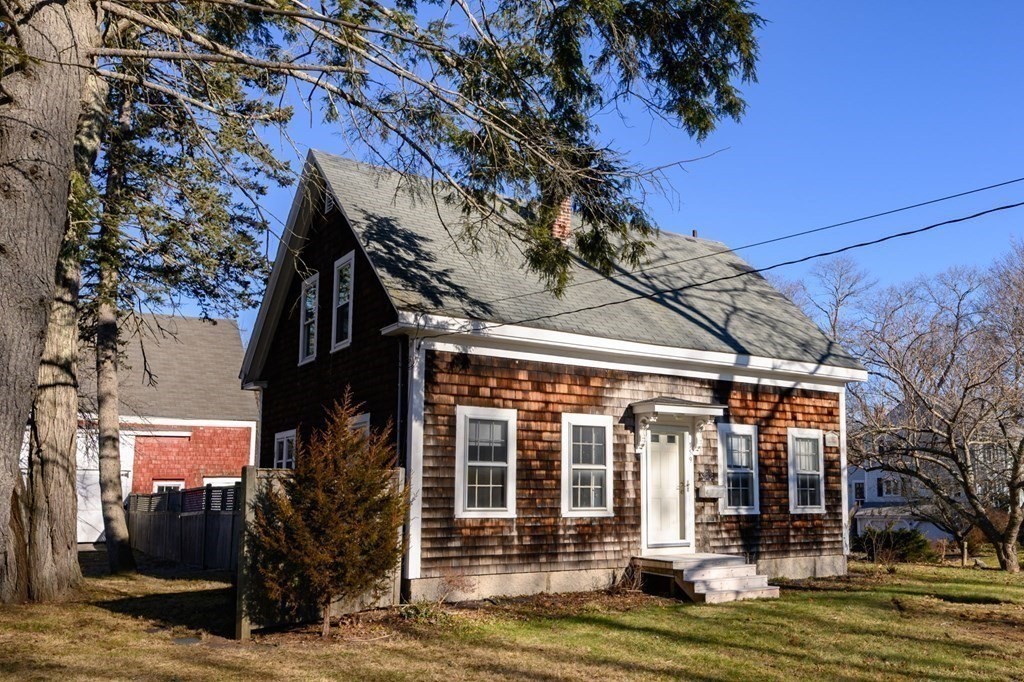 159 High Street Hingham, MA 02043 - Photo 1 of 27 front view of a house with a small yard
