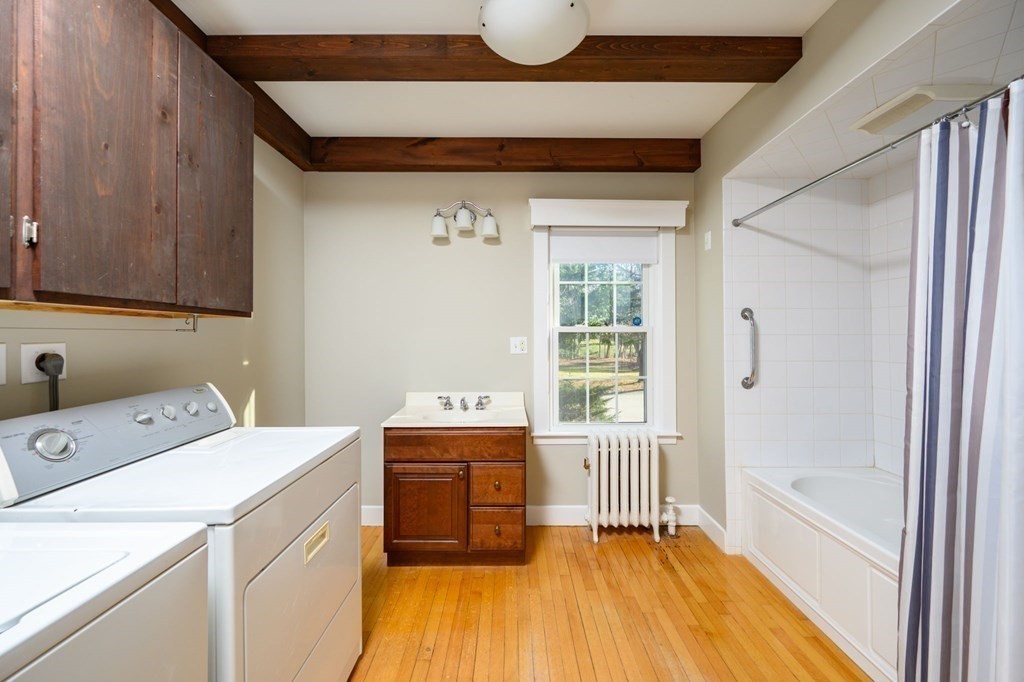 159 High Street Hingham, MA 02043 - Photo 12 of 27 a utility room with dryer and washer