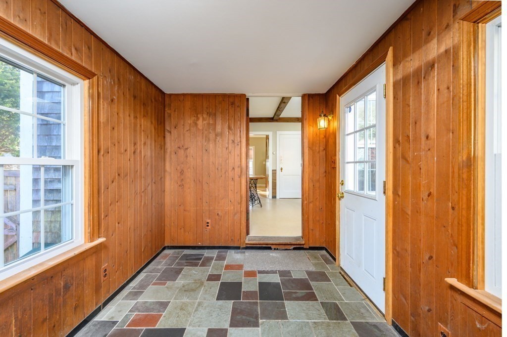 159 High Street Hingham, MA 02043 - Photo 14 of 27 a view of a entryway door with an empty space and windows