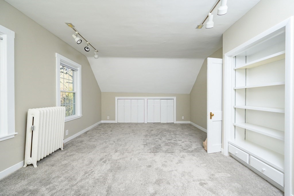 159 High Street Hingham, MA 02043 - Photo 18 of 27 a view of an empty room with a window
