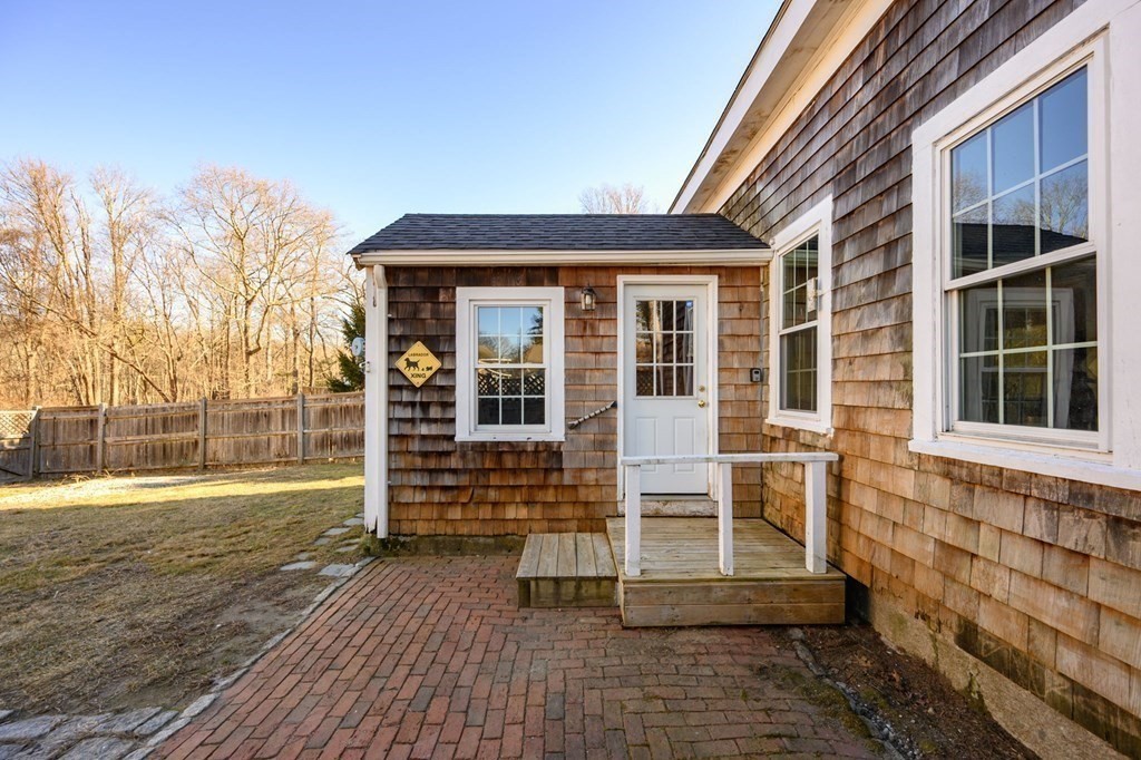 159 High Street Hingham, MA 02043 - Photo 22 of 27 a view of front door of house with wooden floor