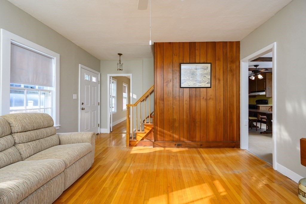 159 High Street Hingham, MA 02043 - Photo 5 of 27 a bedroom with a bed and a couch