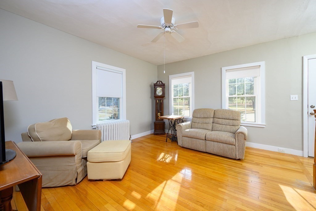 159 High Street Hingham, MA 02043 - Photo 6 of 27 a living room with furniture and a large window