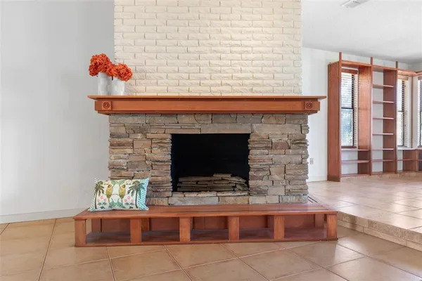 a view of an empty room and workspace