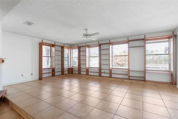 a kitchen with stainless steel appliances granite countertop a sink and a stove