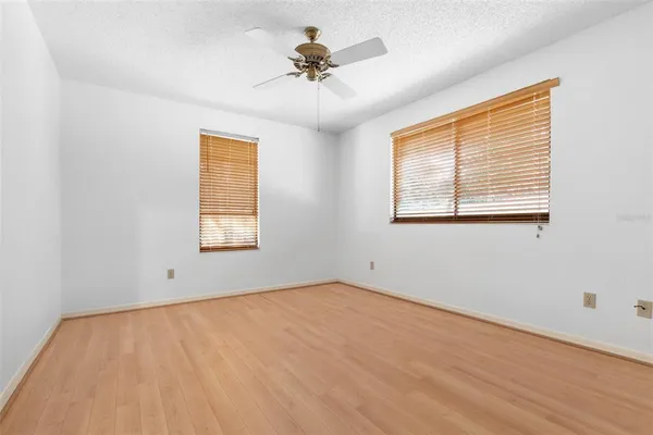 a view of a building with a yard