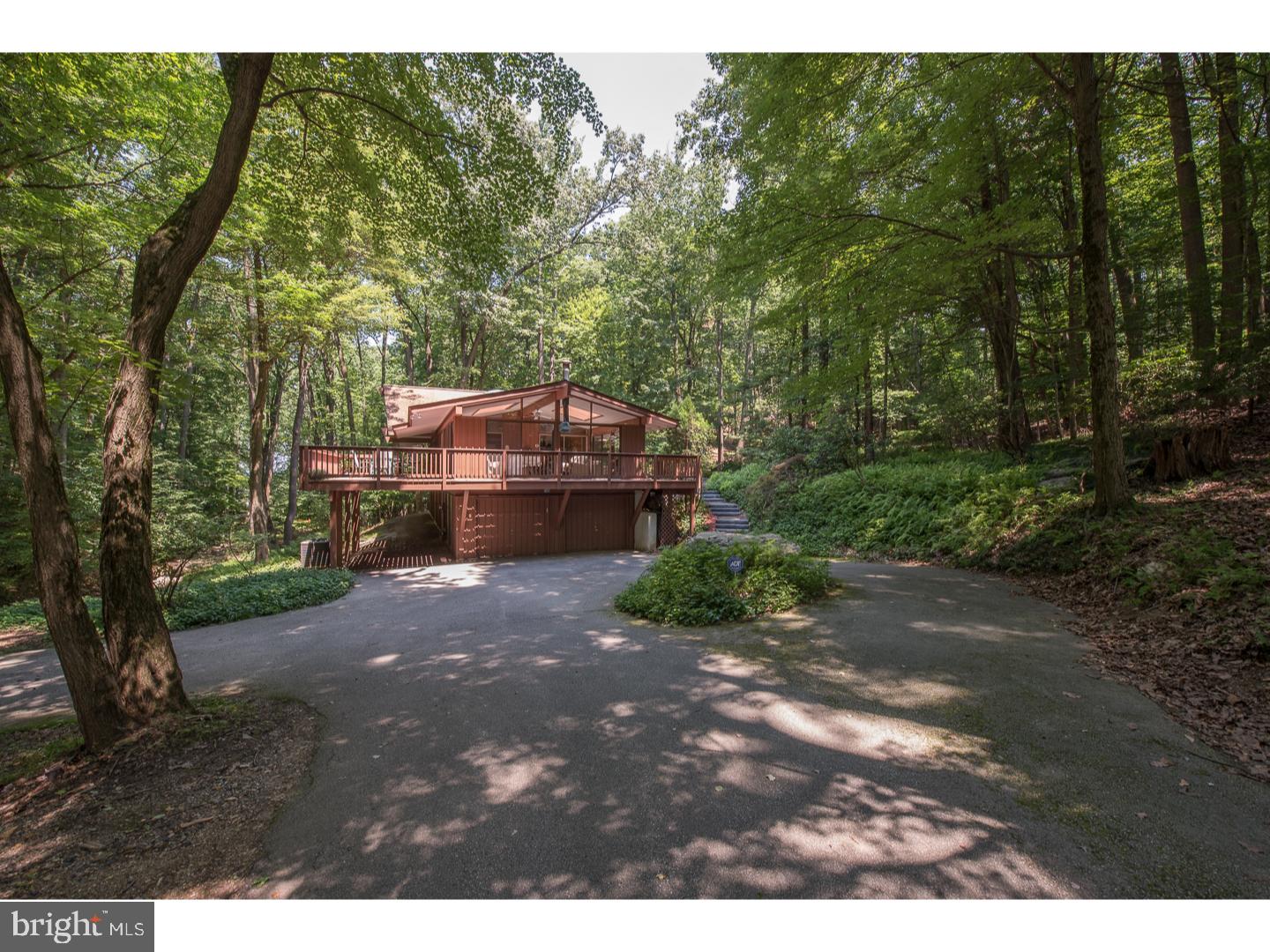597 Upper Weadley Road Wayne, PA 19087 - Photo 16 of 25 a view of house with trees in the background