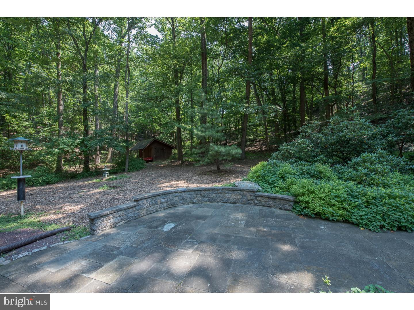 597 Upper Weadley Road Wayne, PA 19087 - Photo 17 of 25 a view of a yard with a tree
