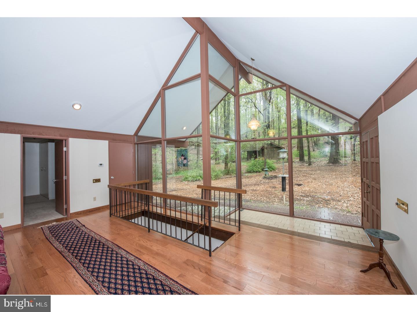 597 Upper Weadley Road Wayne, PA 19087 - Photo 3 of 25 a view of staircase with white walls
