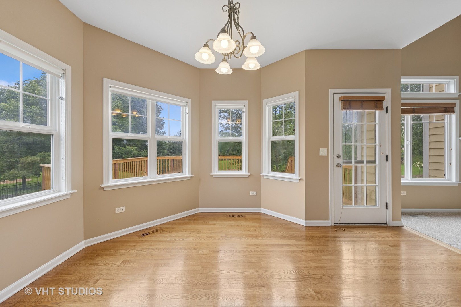 12804 Stellar Lane Plainfield, IL 60585 - Photo 15 of 37 a view of an empty room with a window
