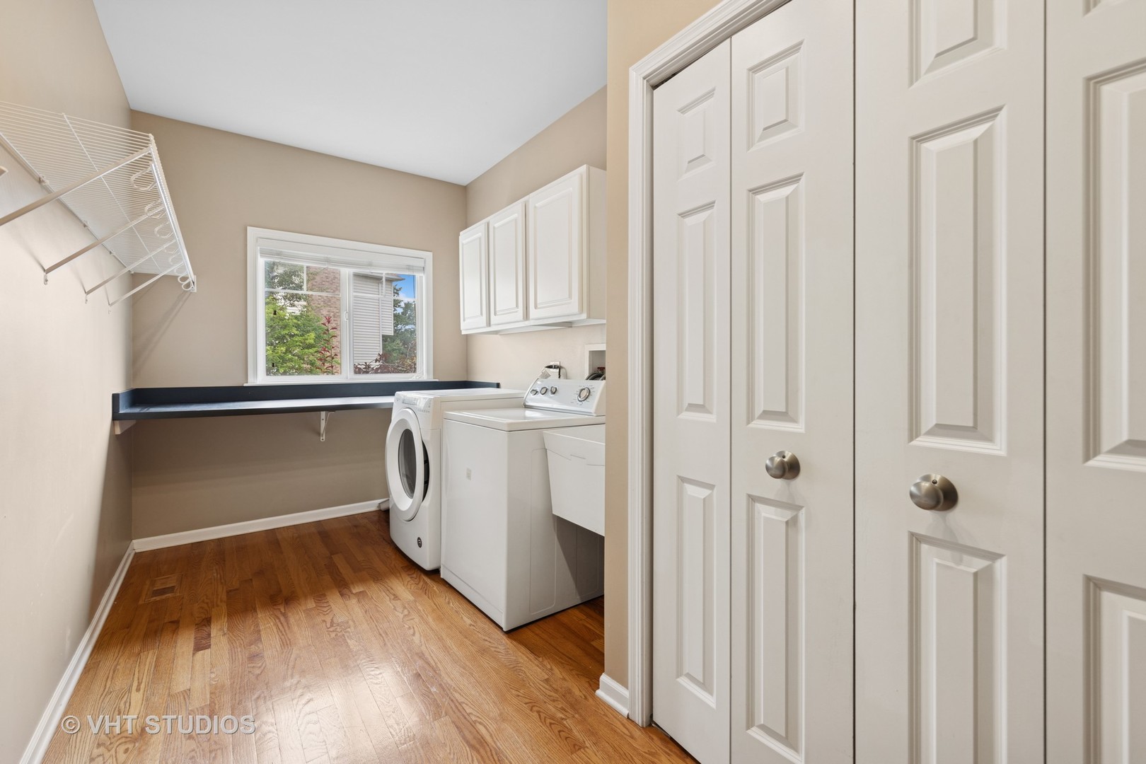 12804 Stellar Lane Plainfield, IL 60585 - Photo 16 of 37 a kitchen with white cabinets and white appliances