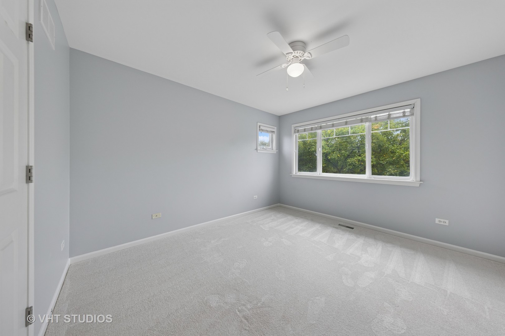 12804 Stellar Lane Plainfield, IL 60585 - Photo 21 of 37 an empty room with windows and closet