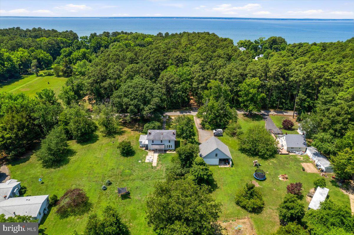 16146 Thomas Road Piney Point, MD 20674 - Photo 66 of 70 an aerial view of a house with garden space and street view