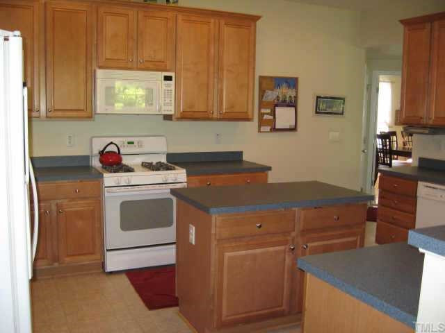 3521 Weir Way Raleigh, NC 27616 - Photo 5 of 12 Kitchen with center island & decorative above-cabinet space Other