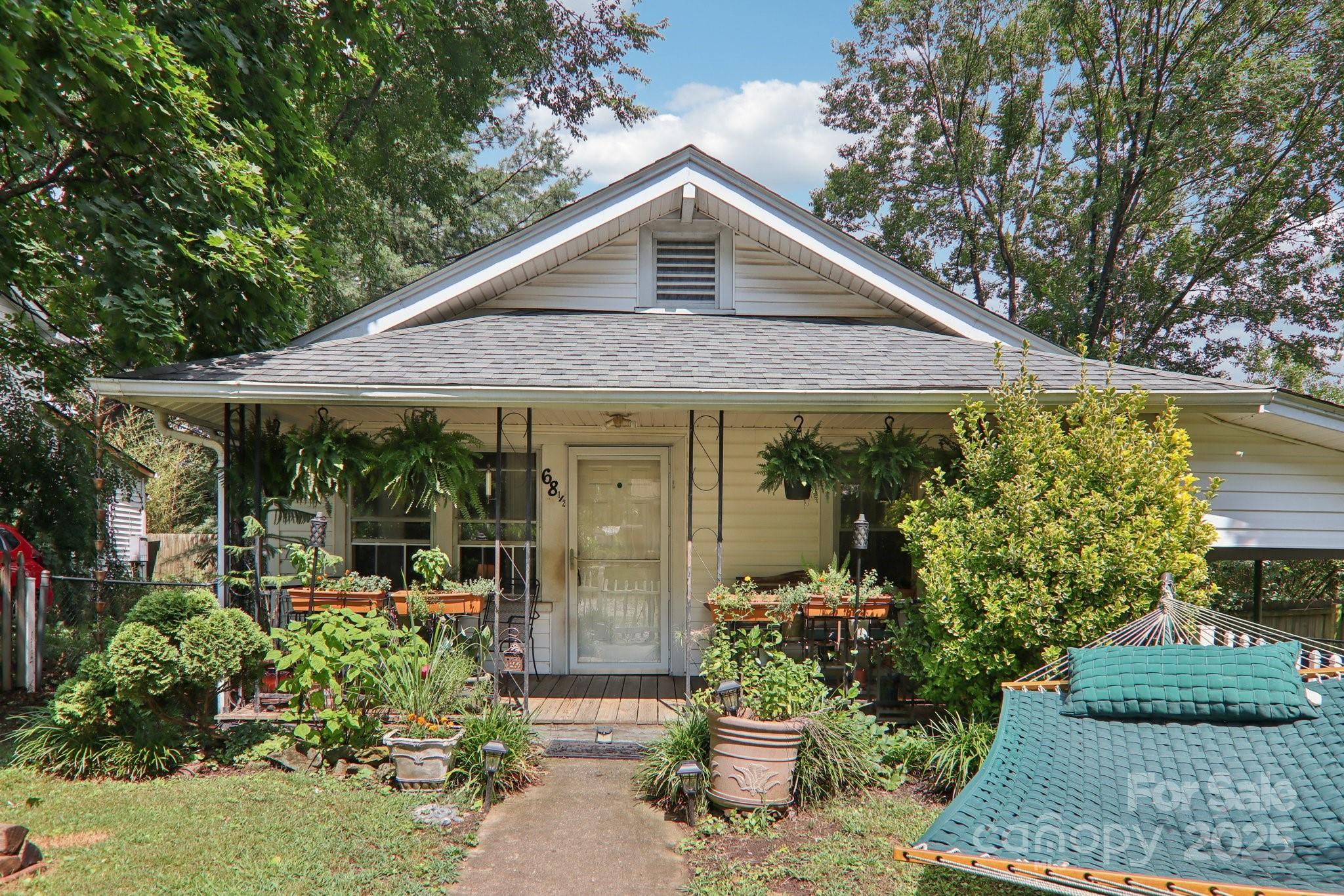 a front view of a house with a porch