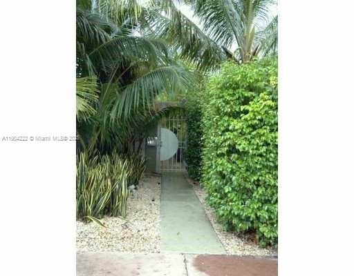 744 Lenox Avenue, Unit 3 Miami Beach, FL 33139 - Photo 13 of 13 a close up of a plant in a garden