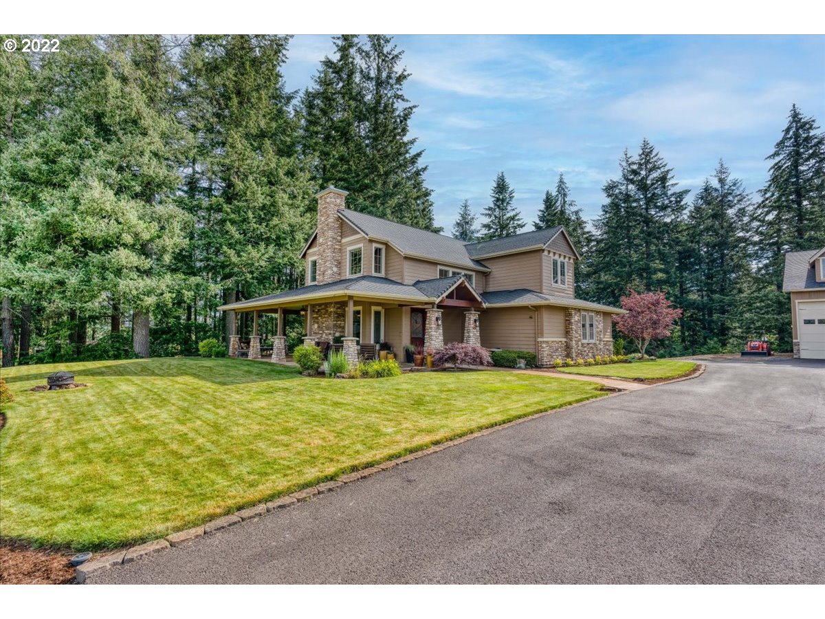 18809 South Kimball Road Oregon City, OR 97045 - Photo 1 of 32 a front view of a house with a yard