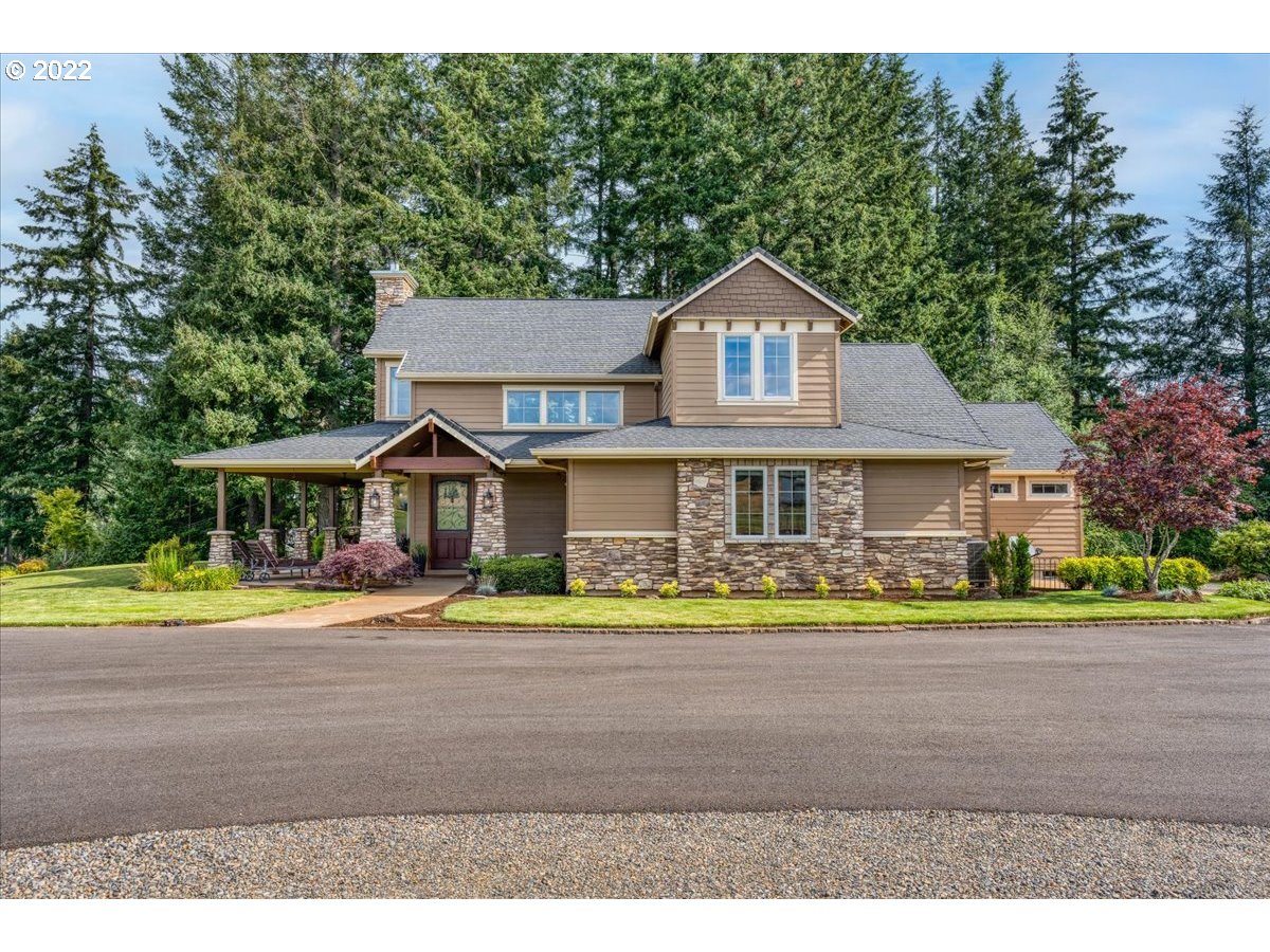 18809 South Kimball Road Oregon City, OR 97045 - Photo 2 of 32 a front view of a house with a yard and potted plants