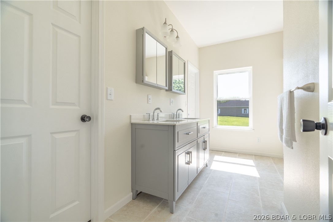 7 Oak Tree Lane Eldon, MO 65026 - Photo 24 of 59 Master bathroom