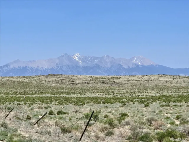 a view of an outdoor space and mountain view in back