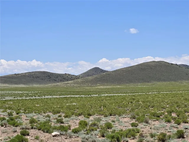 a view of an outdoor space and a yard