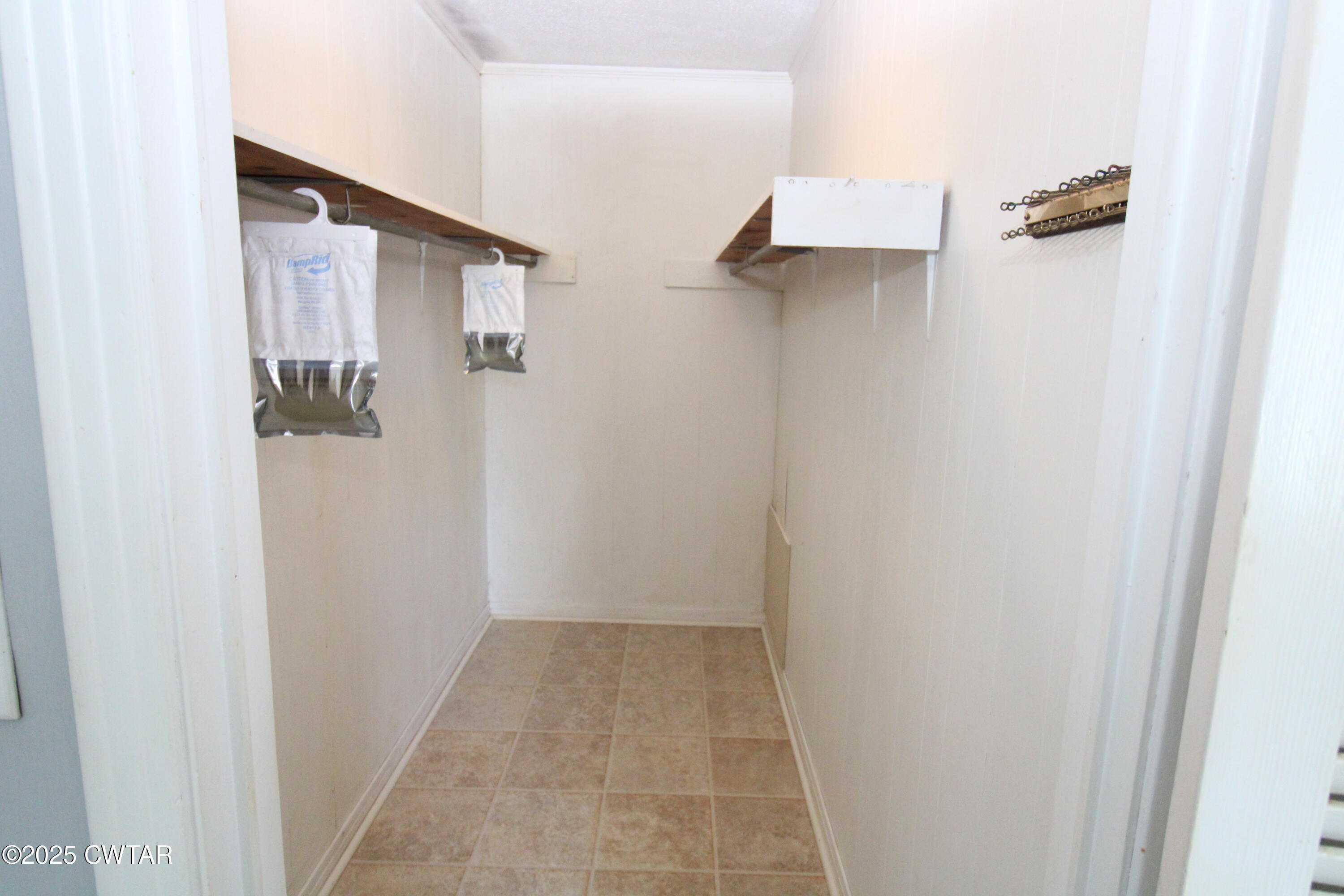 4810 Saltillo Road Saltillo, TN 38370 - Photo 10 of 25 PrimaryBedroomWalkInCloset