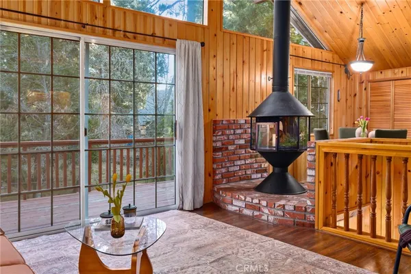 a kitchen with refrigerator and window