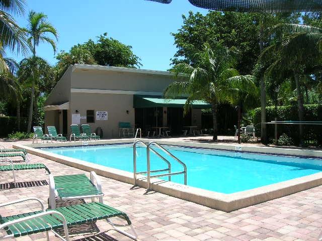 150 Northwest 70th Street, Unit 201 Boca Raton, FL 33487 - Photo 19 of 25 Pool & covered area