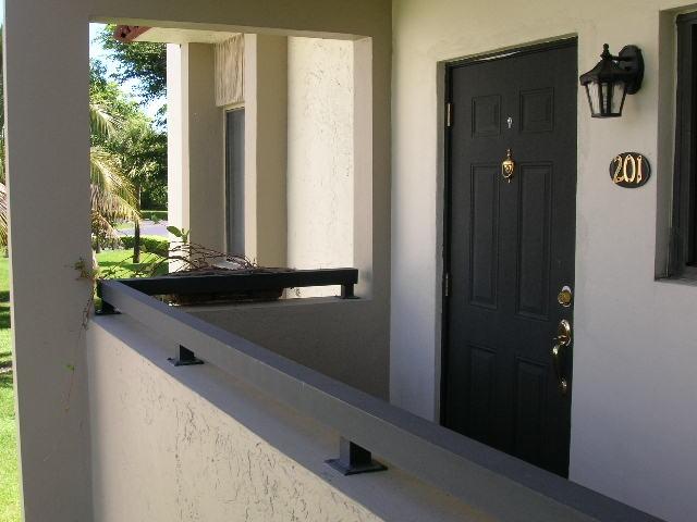 150 Northwest 70th Street, Unit 201 Boca Raton, FL 33487 - Photo 5 of 25 Front door