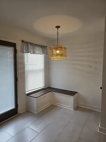 a view of a storage and utility room with closet