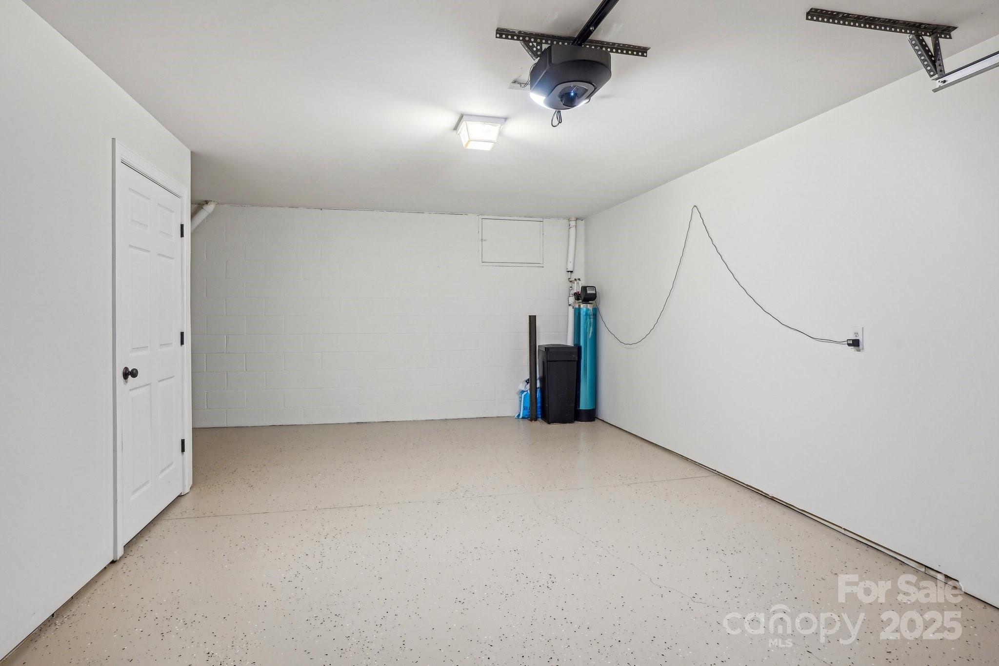 127 High Ridge Road Mooresville, NC 28117 - Photo 23 of 34 an empty room with a ceiling fan and entryway