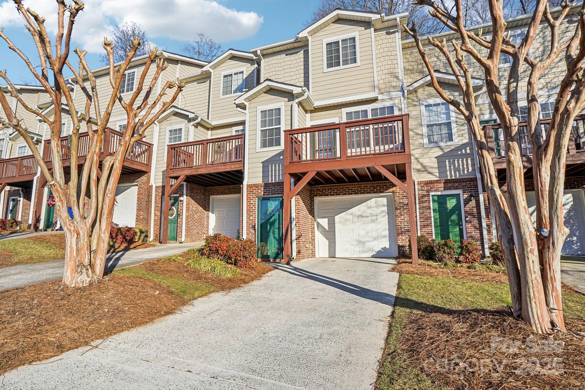 127 High Ridge Road Mooresville, NC 28117 - Photo 31 of 34 front view of a house with a yard