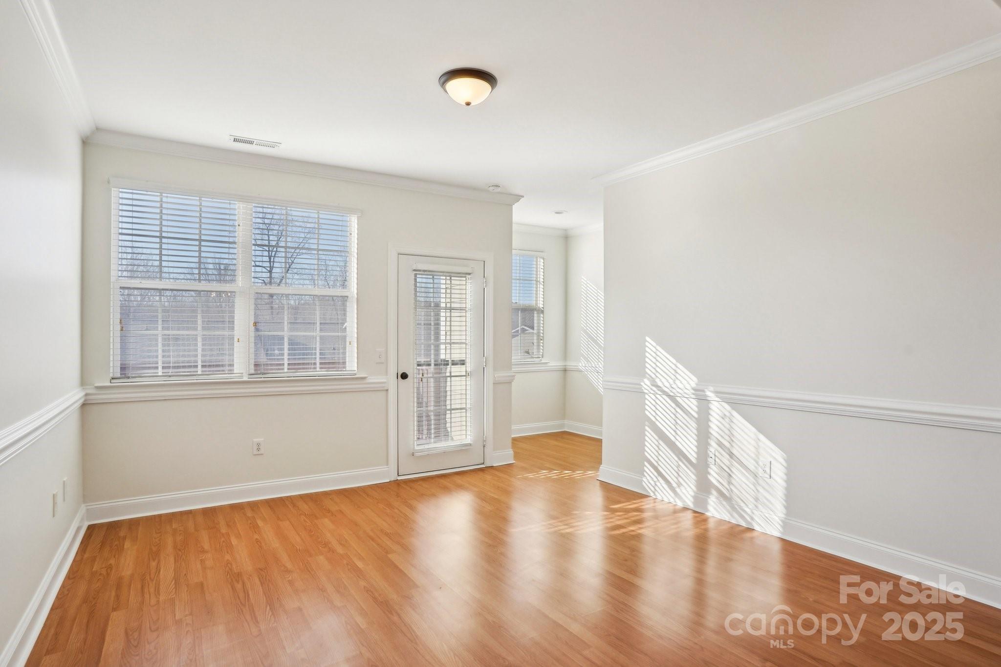 127 High Ridge Road Mooresville, NC 28117 - Photo 5 of 34 a view of empty room with wooden floor and fan